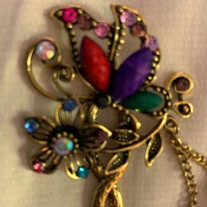 Gold colorful updo hair piece.